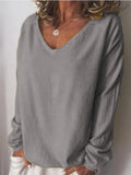 Einfarbige Bluse mit V-Ausschnitt