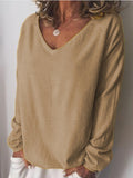 Einfarbige Bluse mit V-Ausschnitt