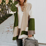 Modische lässige farblich passende mittellange Strickjacke