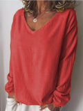 Einfarbige Bluse mit V-Ausschnitt